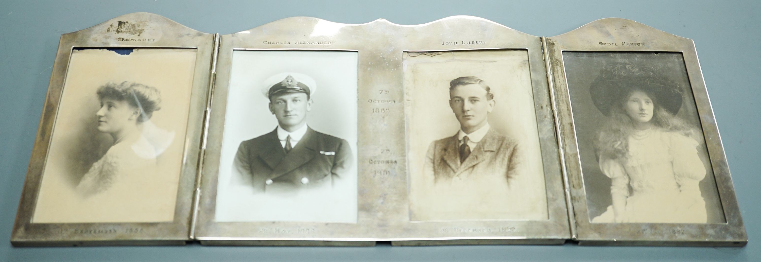A George V silver folding four-division photograph frame, Daniel & John Welby, London, 1910, width 44.6cm